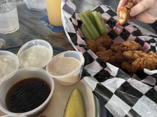 Boneless wings dry with sides of sauce