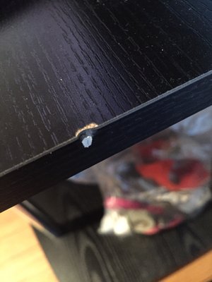 dings like this on the BRAND NEW tv stand. terrible.