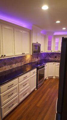 Completely remodeled kitchen with LED color changing lights above and below upper cabinets