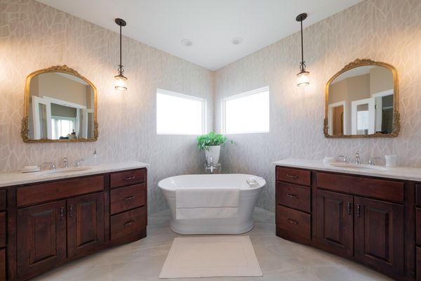 Bathroom remodel includes new windows and tile walls. #WCIDesignCenter