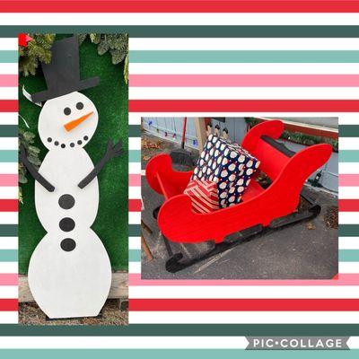 Handcrafted snowman and large sleigh would look great for your decorations.