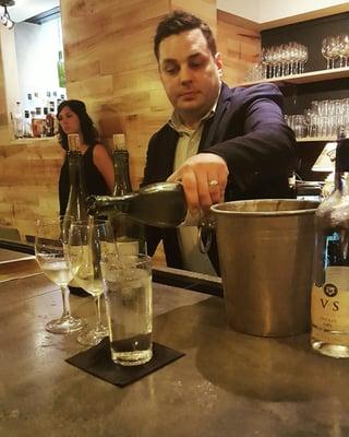 Zach pouring the Chardonnay wines to taste