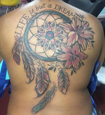 Life is but a dream back tattoo.  #dreamcatcher #flowers tattoo by #LordYatta done at Tri-Cities Tattoo