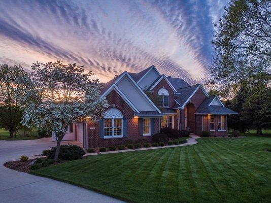 A low elevation aerial shot on this beautiful home in Portage, Mi.