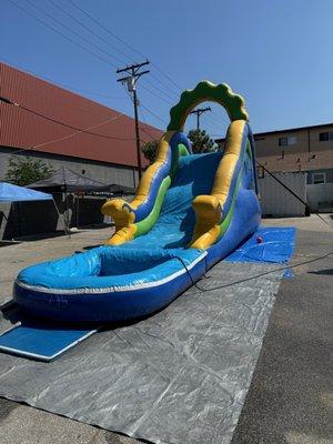 Rainbow water slide with pool.  The pool is detachable and it can be used tonslidenintonyour home pool.  It has hole attachments.