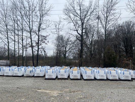 Bagged and dumped sand available.