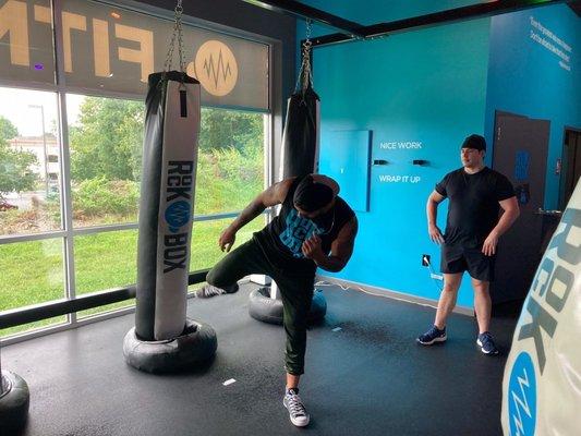 MMA fighter/trainer Tommy Debo getting that bag work.