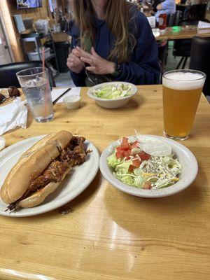 Pulled pork hoagie with a salad and draft IPA. Pretty good!