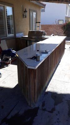 Redid tile and made repairs to an outdoor Isla d BBQ. Also replaced a sink and fixed all plumbing.