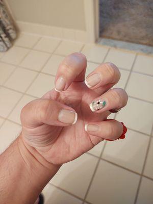 This French manicure with designs is extremely elegant!!!!!