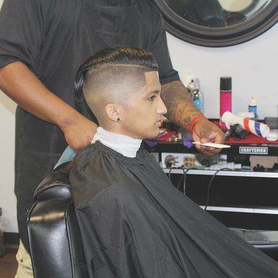 Yeah we do straight hair to haircut in photo was done by Mario the barber