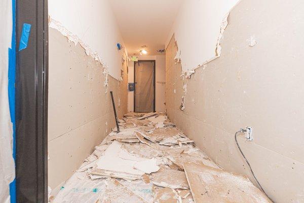 demolition of wet drywall due to a main line burst