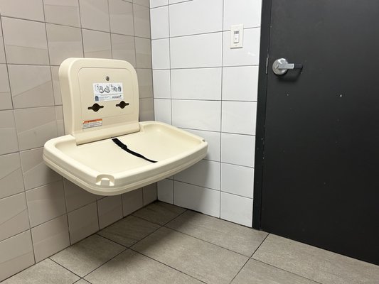 Baby changing table installed too low and sloped down