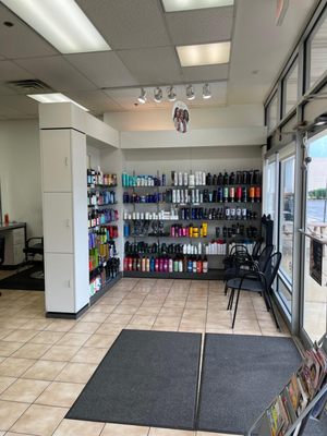 The shelves with products available for purchase at a Hair Cuttery Salon.