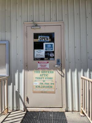 Door with hours and rules