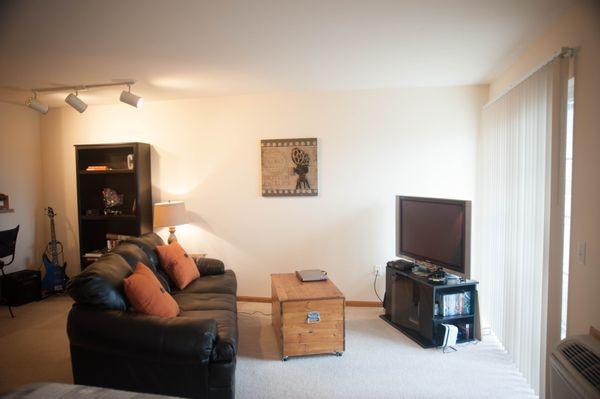 Living space inside a studio apartment at Autumn Wood! Call today to schedule your showing (608) 244-8582.