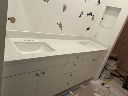 Refreshing this vanity with a new countertop and hardware