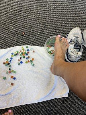 Challenged! Picking up marbles with my toes