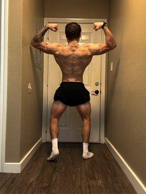 7 Trials Strength Training CO-Owner and Coach Seth LeFlore showing an impressive rear double bicep transformation!