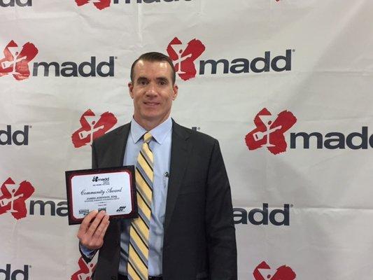 Attorney James Johnson is given an award by Mothers Against Drunk Driving (MADD) - 2017