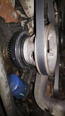 New harmonic balancer and oil leak repair