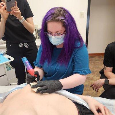 This is me Microneedling   a patient during training.