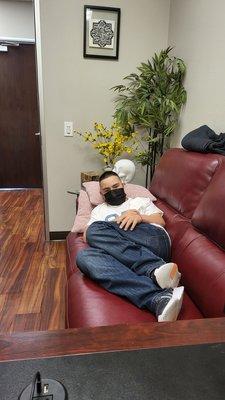 My patient relaxing at my office after his treatment