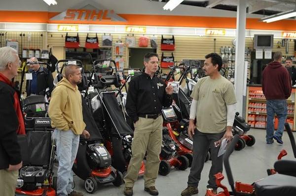 Erick Herman, our equipment sales manager talking with a few commercial landscapers.