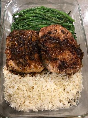 Center-cut, butterfly Birkshire pork loin with apricot glaze, basmati rice and braised green beans.