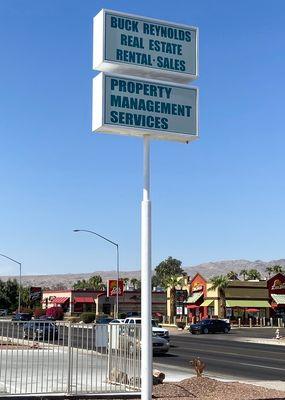 Office sign located on HWY 95