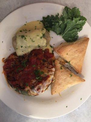 Greek combo, stuffed pepper, suffered cabbage and spanakopita.