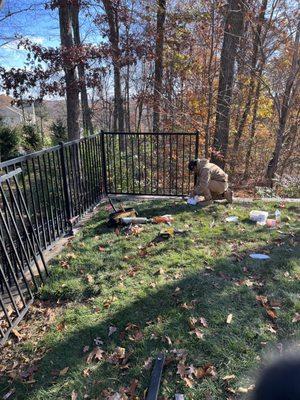 *4' black aluminum fence repair on a retaining wall that had collapsed!