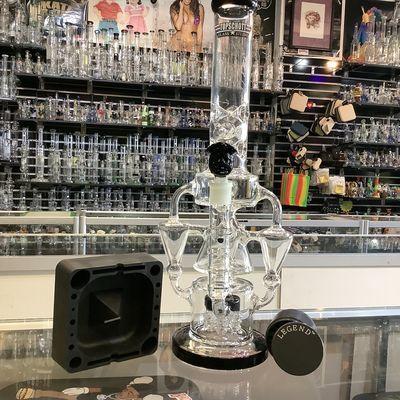 Triple uptake recycler bong setup with a black 4 stacked grinder and a debowler silicone ashtray