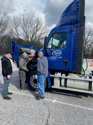 Students and faculty of Sage Truck Driving School.