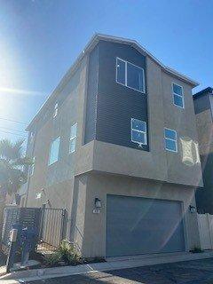 Side yard, enclosed front porch and upstairs outside patio