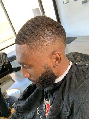 Mid-high skin fade with beard