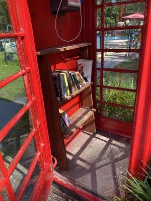 Book exchange inside the telephone booth