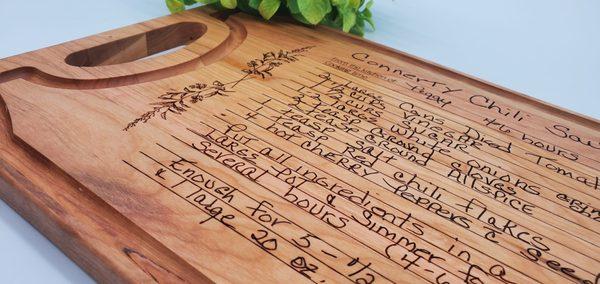 Made right here in the store, handwritten recipe cutting boards. Bring us your recipe!