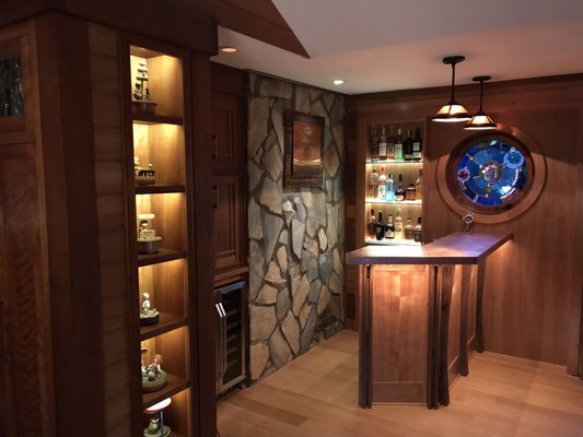 Cherry and walnut bar with beaten copper top and granite work surface.  Guy built the bar and installed the top.