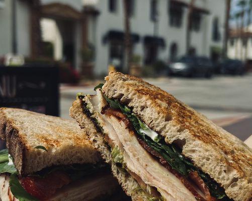 Turkey, Bacon, Avocado Served on multi-grain bread with lettuce, tomato, mayo, and swiss cheese