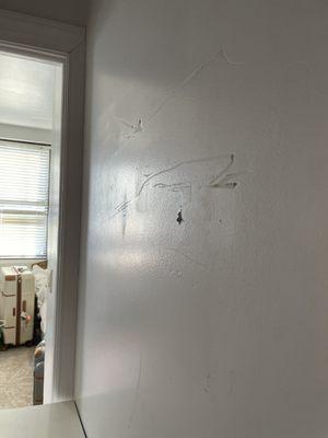 Damage to my wall -dent and scratches