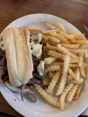 Philly CheeseSteak Sandwich And Crinkle Cut Fries.