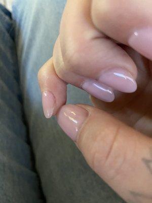 There's the nail and then the tip is smaller than her nail?