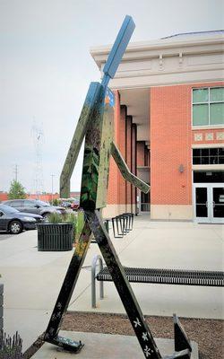 Walking Man sculpted by Levi Rinker (2012) and painted by Cynthia Young (2019)