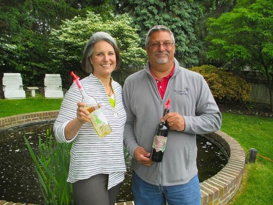 Tasting room manager, Rebecca with vineyard owner & wine maker, Richard.