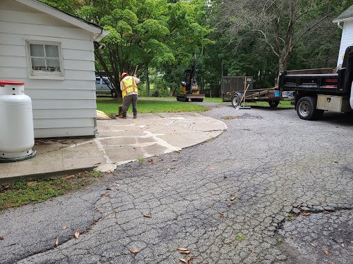 Before Concrete & Blacktop removal and restoration