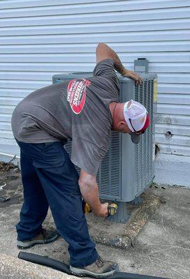 Installing three brand new Daikin units for a church on a hot, summer day!