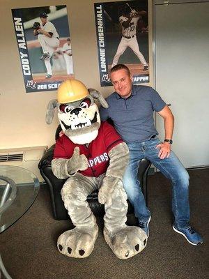 Owner Greg Davis hangs out with Scrappy at a Wellness Night at Eastwood Field.