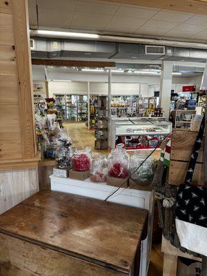 A peek into the grocery area from the dining room.