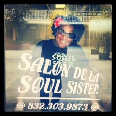 Salon owner Georgette on the day her window was labeled.